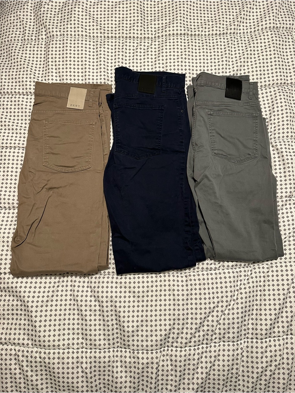 Three DKNY 32x34 Slim Khakis